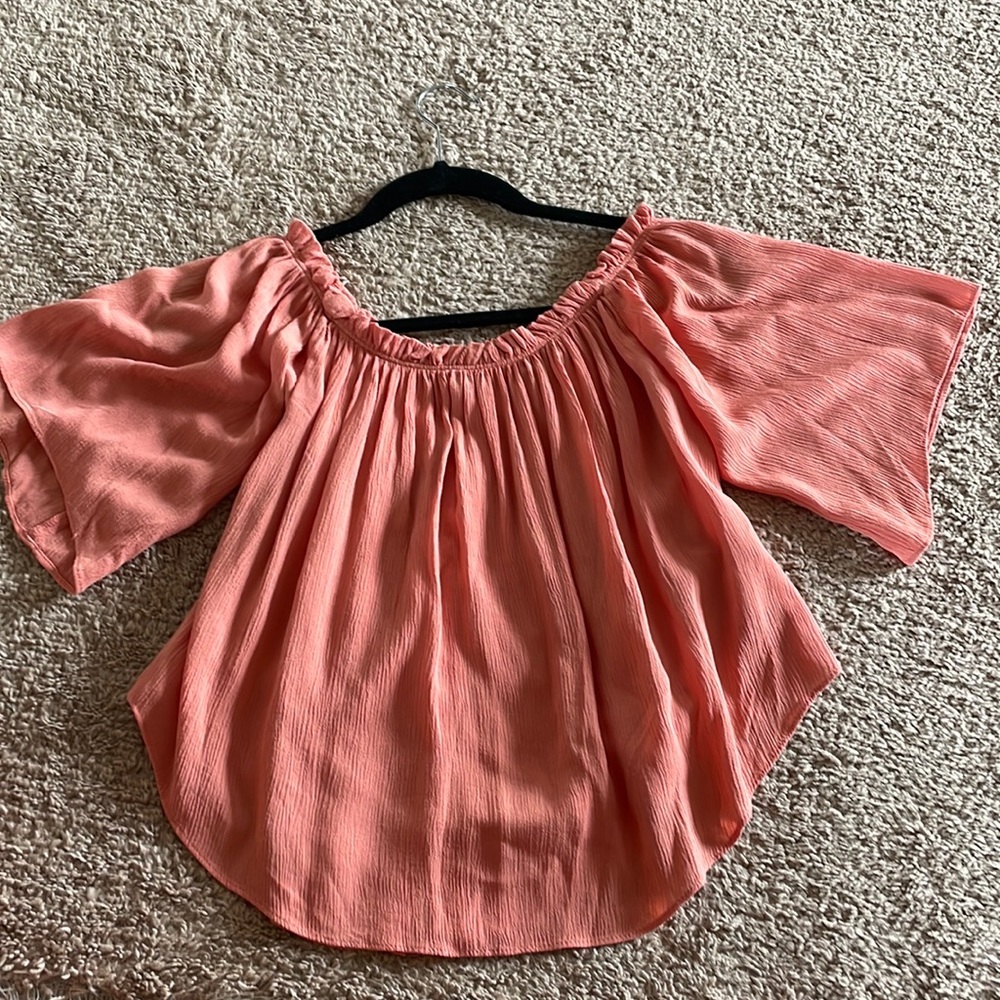 Blouse with buttons down the “back”